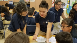 Acosta students conducting group work.